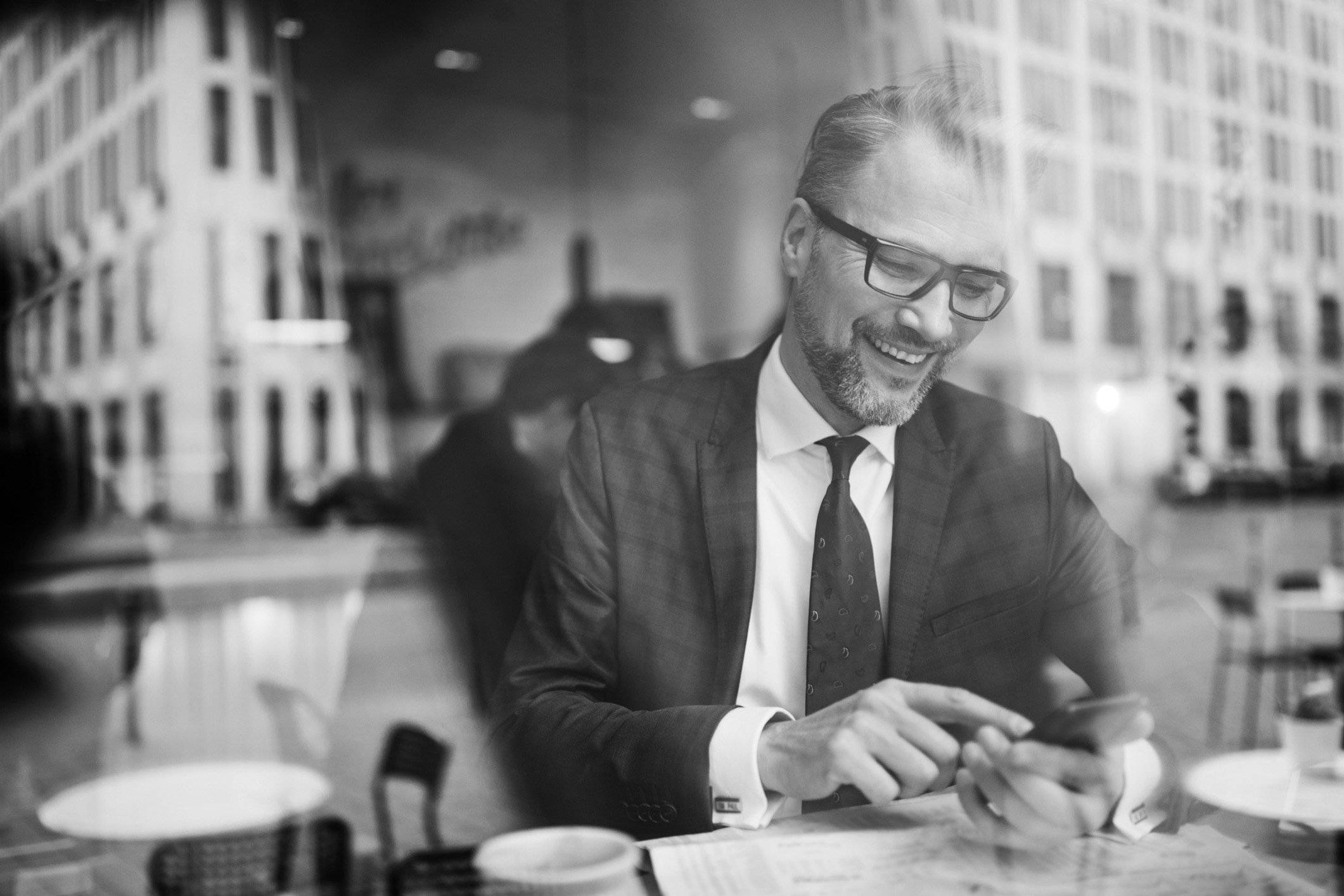 financial adviser smiling in cafe